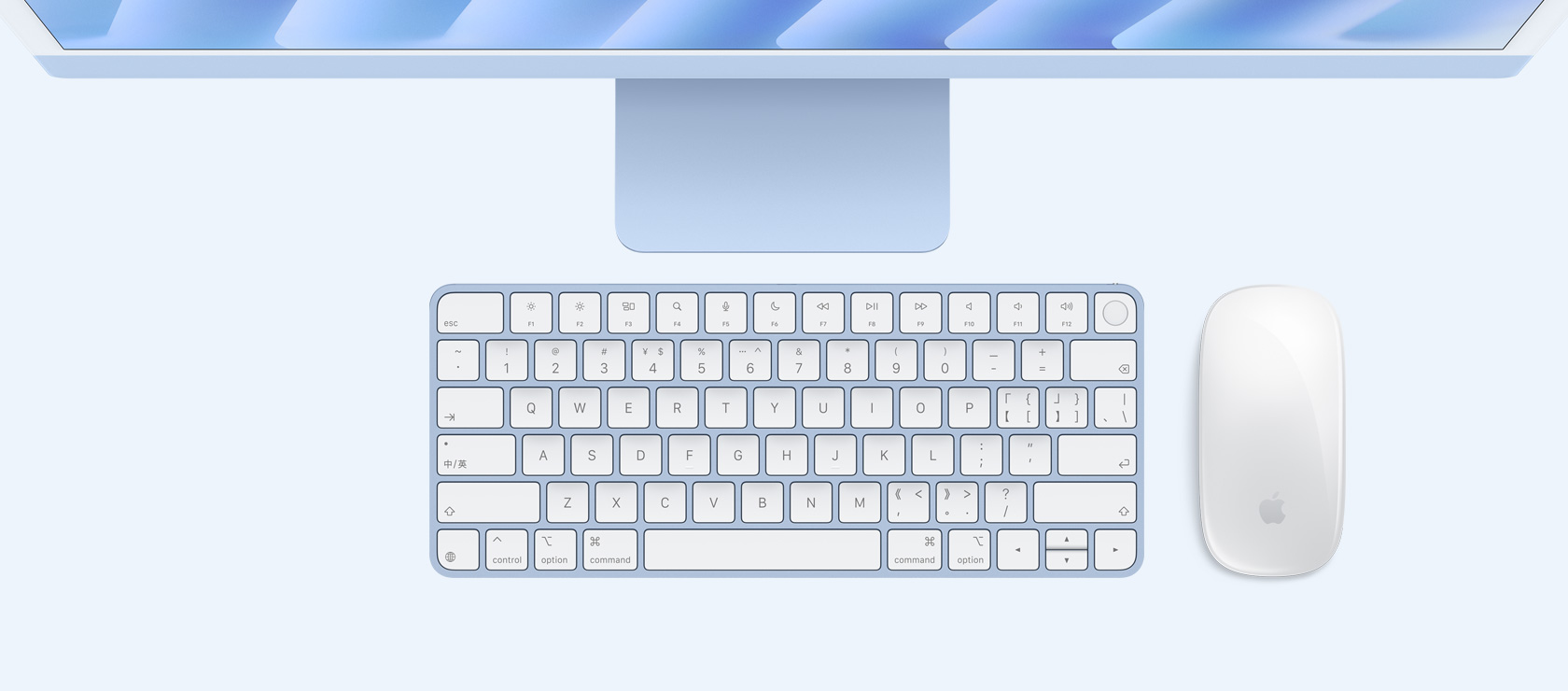 蓝色 iMac 配同色系鼠标和键盘的俯视图