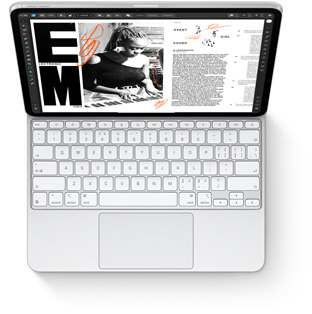 iPad Pro 连接在适用于 iPad Pro 的白色妙控键盘上，以俯视视角展示设备搭配键盘的效果。